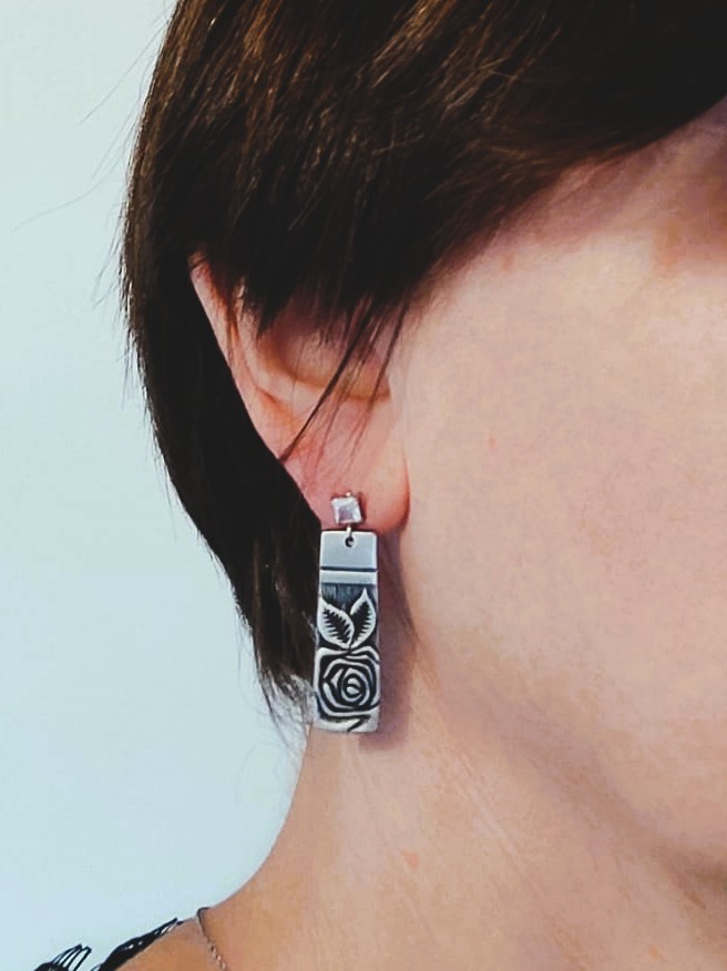 Boucles d'oreilles fleurs portées